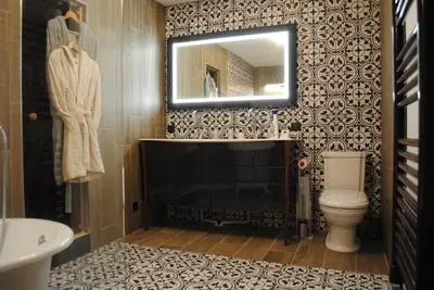 Salle de bains dans l'établissement Suite au château - Domaine de la Gavolerie