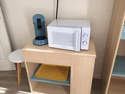 Cuisine ou kitchenette dans l'établissement Chambre dans dépendance Maison de Ville + abri vélos