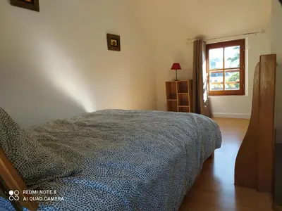 Un ou plusieurs lits dans un hébergement de l'établissement Maison cosy au cœur du Lochois