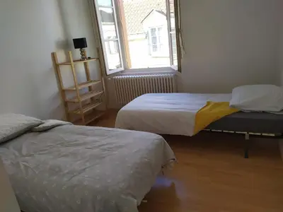 Un ou plusieurs lits dans un hébergement de l'établissement Maison cosy au cœur du Lochois