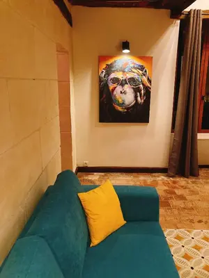 Coin salon dans l'établissement L’Alcalys - Maison de vacances au vert - Sans TV