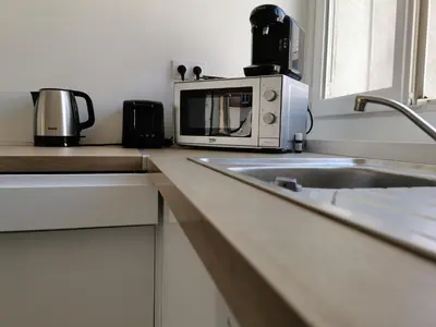 Cuisine ou kitchenette dans l'établissement L'EMILIO - hypercentre, lumineux et vue Loire