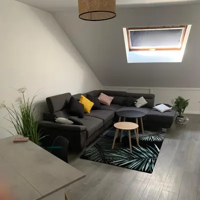 Coin salon dans l'établissement Appartement 4 PERSONNES EMPLACEMENT IDEAL PROCHE DES 24H ET GARE