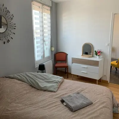 Un ou plusieurs lits dans un hébergement de l'établissement Appartement 4 PERSONNES EMPLACEMENT IDEAL PROCHE DES 24H ET GARE