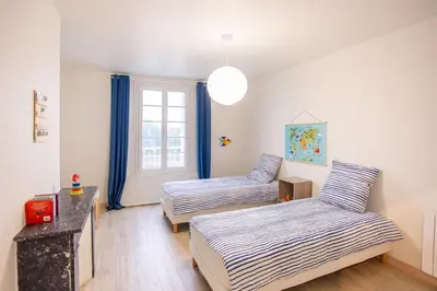 Un ou plusieurs lits dans un hébergement de l'établissement L'AMASSE Échappée Amboisienne T3 avec sauna partagé