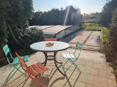 Jardin de l'établissement Appartements avec piscine