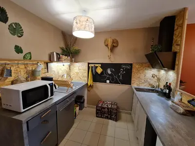 Cuisine ou kitchenette dans l'établissement Le Lude Land Lodge