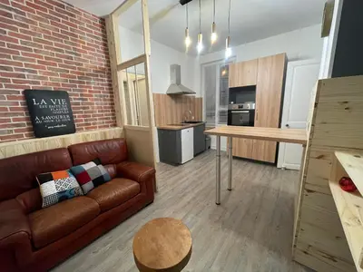 Cuisine ou kitchenette dans l'établissement Logement entier: Appartement avec Terrasse Quartier de la Gare