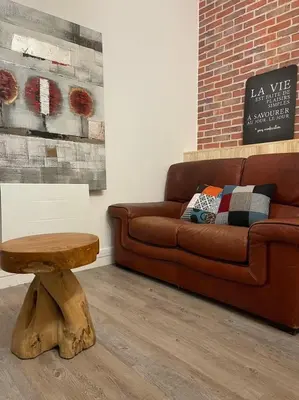 Coin salon dans l'établissement Logement entier: Appartement avec Terrasse Quartier de la Gare