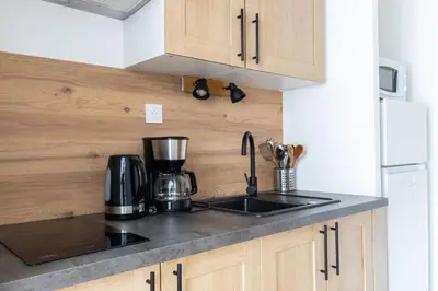Cuisine ou kitchenette dans l'établissement Studio Elément - Feu