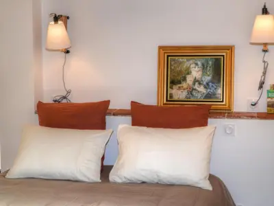 Un ou plusieurs lits dans un hébergement de l'établissement Gîte douillet à Luzillé avec terrasse, jardin, climatisation, proche Château de Chenonceau et Zoo de Beauval - FR-1-381-513