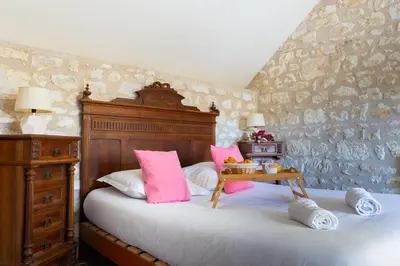 Un ou plusieurs lits dans un hébergement de l'établissement Maison Camilia