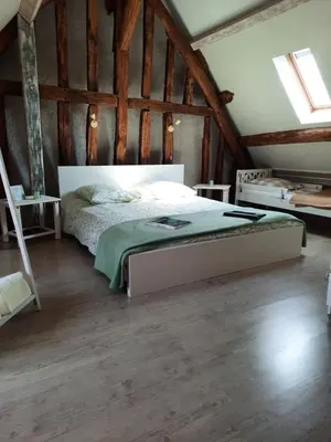 Un ou plusieurs lits dans un hébergement de l'établissement La Maison Genevier - Chambre La Family
