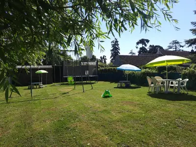 Jardin de l'établissement La Maison Genevier - Chambre Marguerite