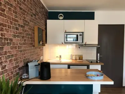 Cuisine ou kitchenette dans l'établissement Studio avec balcon & parking gratuit - Tours Gare