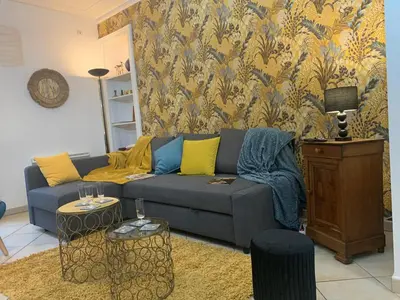 Coin salon dans l'établissement Maison Chic & charme Calme avec Jardin
