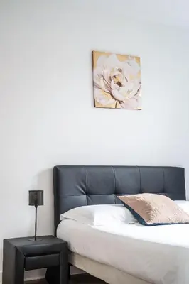 Un ou plusieurs lits dans un hébergement de l'établissement Maison tout confort, parking, clim, garage 3ch 5p