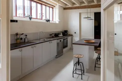 Cuisine ou kitchenette dans l'établissement Gite de Vonnes