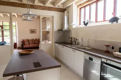 Cuisine ou kitchenette dans l'établissement Gite de Vonnes