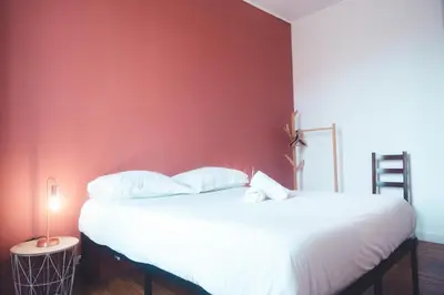 Un ou plusieurs lits dans un hébergement de l'établissement Le Ronsardien - Appartement calme et confortable
