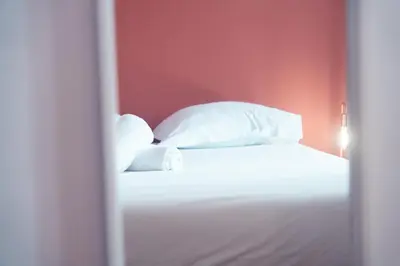 Un ou plusieurs lits dans un hébergement de l'établissement Le Ronsardien - Appartement calme et confortable