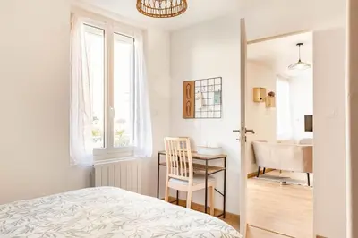 Un ou plusieurs lits dans un hébergement de l'établissement Maison tourangelle chic & cosy avec cour