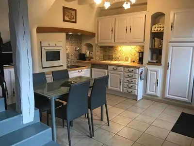 Cuisine ou kitchenette dans l'établissement Gîte Maison de Sophie