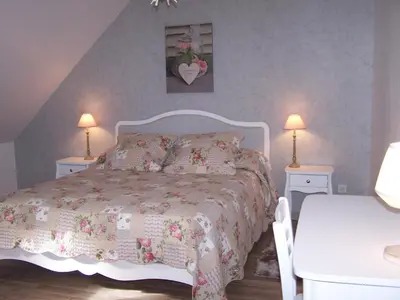 Un ou plusieurs lits dans un hébergement de l'établissement Gîte Grandeur Nature