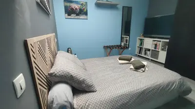 Un ou plusieurs lits dans un hébergement de l'établissement LOFT Descartes