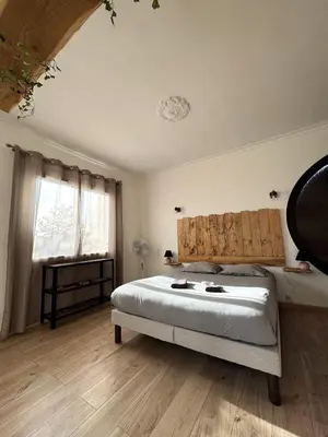 Un ou plusieurs lits dans un hébergement de l'établissement Balade en Forêt, 3min du Zoo