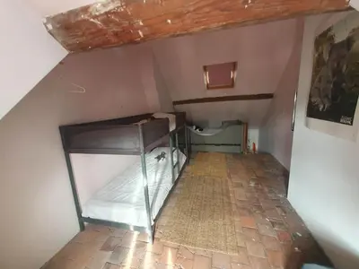 Un ou plusieurs lits dans un hébergement de l'établissement Chez Effat et marie T A C 4