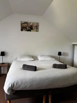 Un ou plusieurs lits dans un hébergement de l'établissement Cottage 102