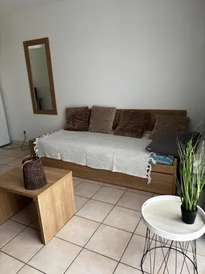 Coin salon dans l'établissement Cottage 102