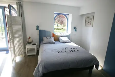 Un ou plusieurs lits dans un hébergement de l'établissement Le Clos Bener