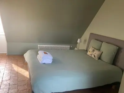 Un ou plusieurs lits dans un hébergement de l'établissement Chambre Sixtine
