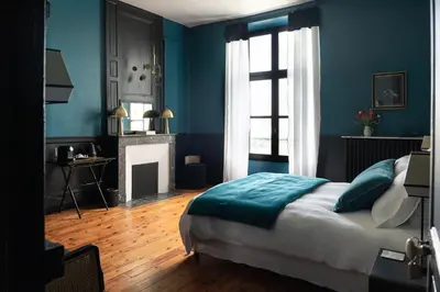 Un ou plusieurs lits dans un hébergement de l'établissement MAISON HULOTTE