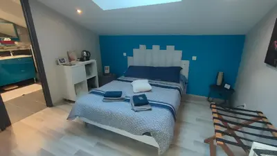 Un ou plusieurs lits dans un hébergement de l'établissement LOFT 2 Descartes