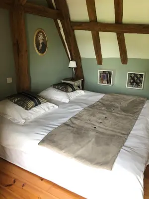 Un ou plusieurs lits dans un hébergement de l'établissement Cottage du vigneron