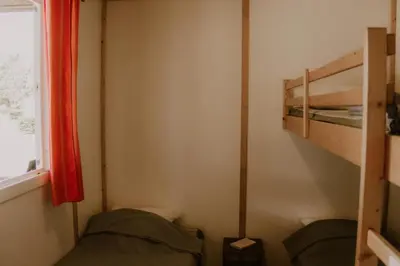 Un ou plusieurs lits dans un hébergement de l'établissement Camping Onlycamp Le Pont Romain