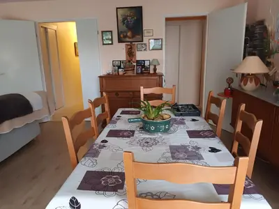 Coin salon dans l'établissement grand appartement en résidence