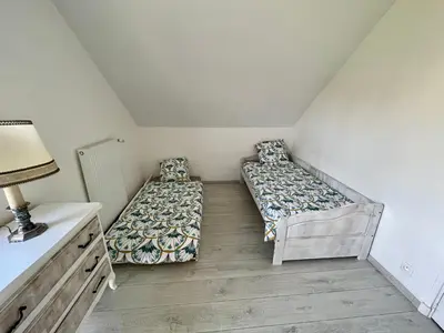 Un ou plusieurs lits dans un hébergement de l'établissement Face Chateau de Chaumont sur loire Gîte La Rapinière