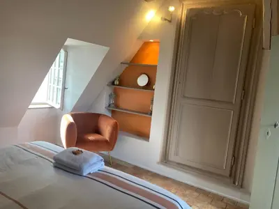 Un ou plusieurs lits dans un hébergement de l'établissement Chambres Calix