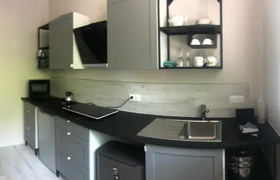 Cuisine ou kitchenette dans l'établissement Studio Comtes du Maine