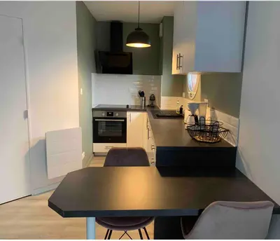 Cuisine ou kitchenette dans l'établissement Cocon à TRELAZE