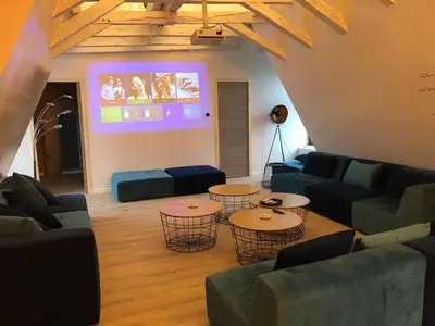 Coin salon dans l'établissement GITE LOFT DE 15 PERSONNES AU CHATEAU DE JALLANGES VOUVRAY
