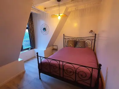 Un ou plusieurs lits dans un hébergement de l'établissement GITE LOFT DE 15 PERSONNES AU CHATEAU DE JALLANGES VOUVRAY