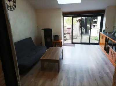 Coin salon dans l'établissement Agréable maison de ville tout confort