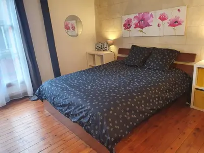 Un ou plusieurs lits dans un hébergement de l'établissement Gîte de l'orangerie du château de Jallanges- 11 personnes