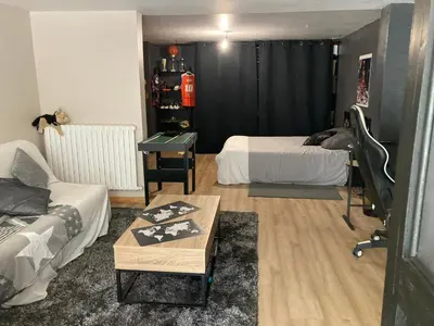 Coin salon dans l'établissement Maison ligne droite des Hunaudières-Circuit 24H du Mans