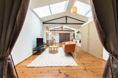 Coin salon dans l'établissement Zen & Spa - Maison Cosy - Tours - Netflix